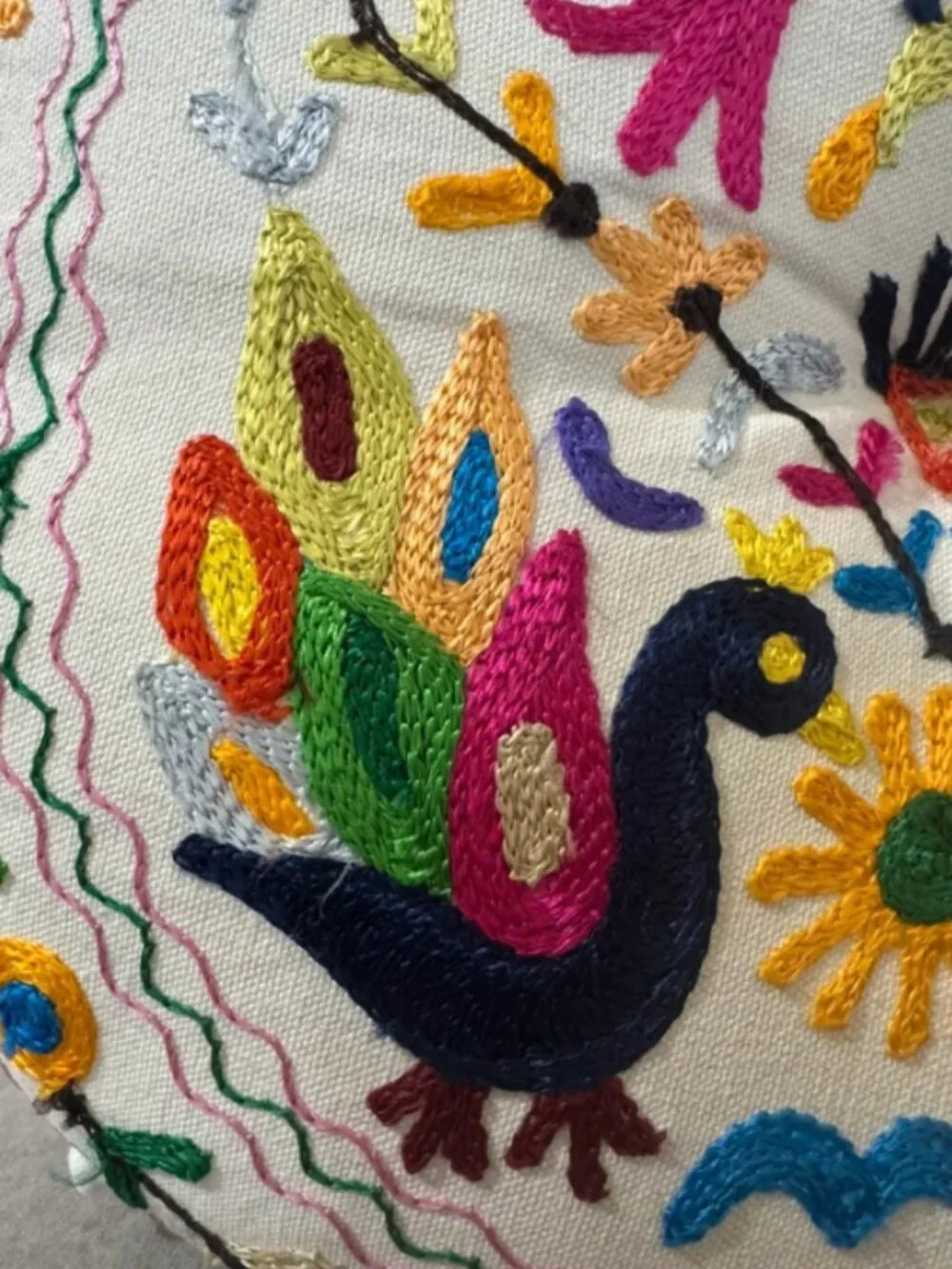 Embroidered round decorative pillow